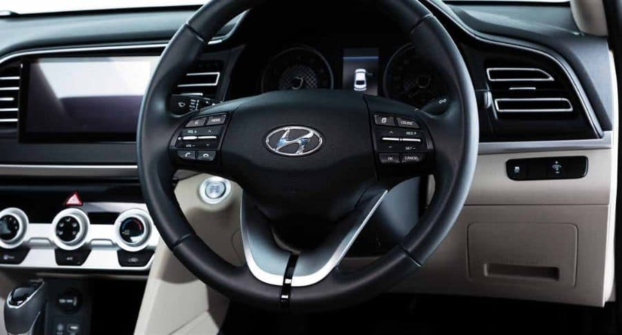 Leather steering wheel with cruise control